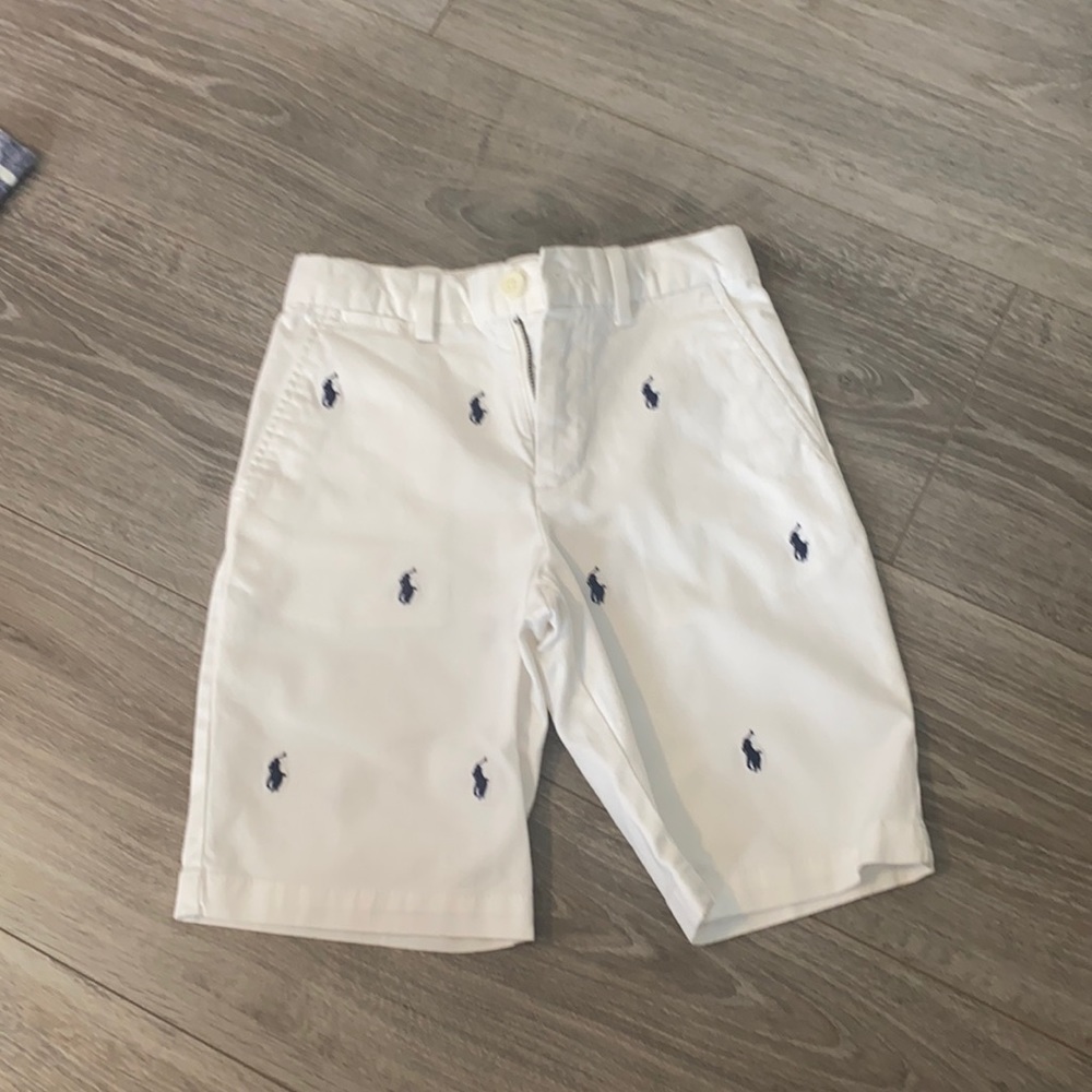 White polo shirt with blue logo